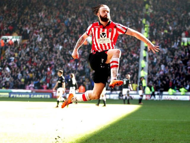 Sheffield United's John Brayford celebrates scoring their second goal during the FA Cup Sixth Round match at Bramall Lane, Sheffield