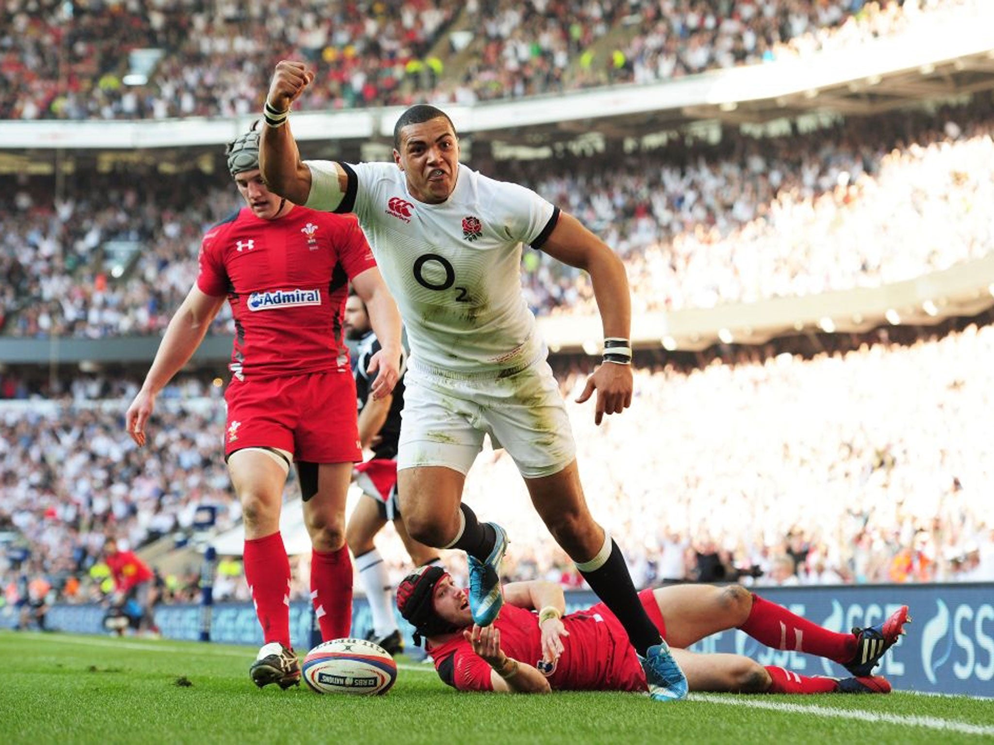 Luther Burrell of England celebrates as he scores their second try during the RBS Six Nations match between England and Wales at Twickenham Stadium in London (Getty)