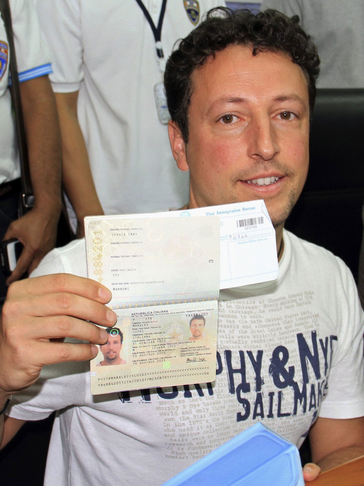 Italian Luigi Maraldi shows the passport that replaced the one he had stolen