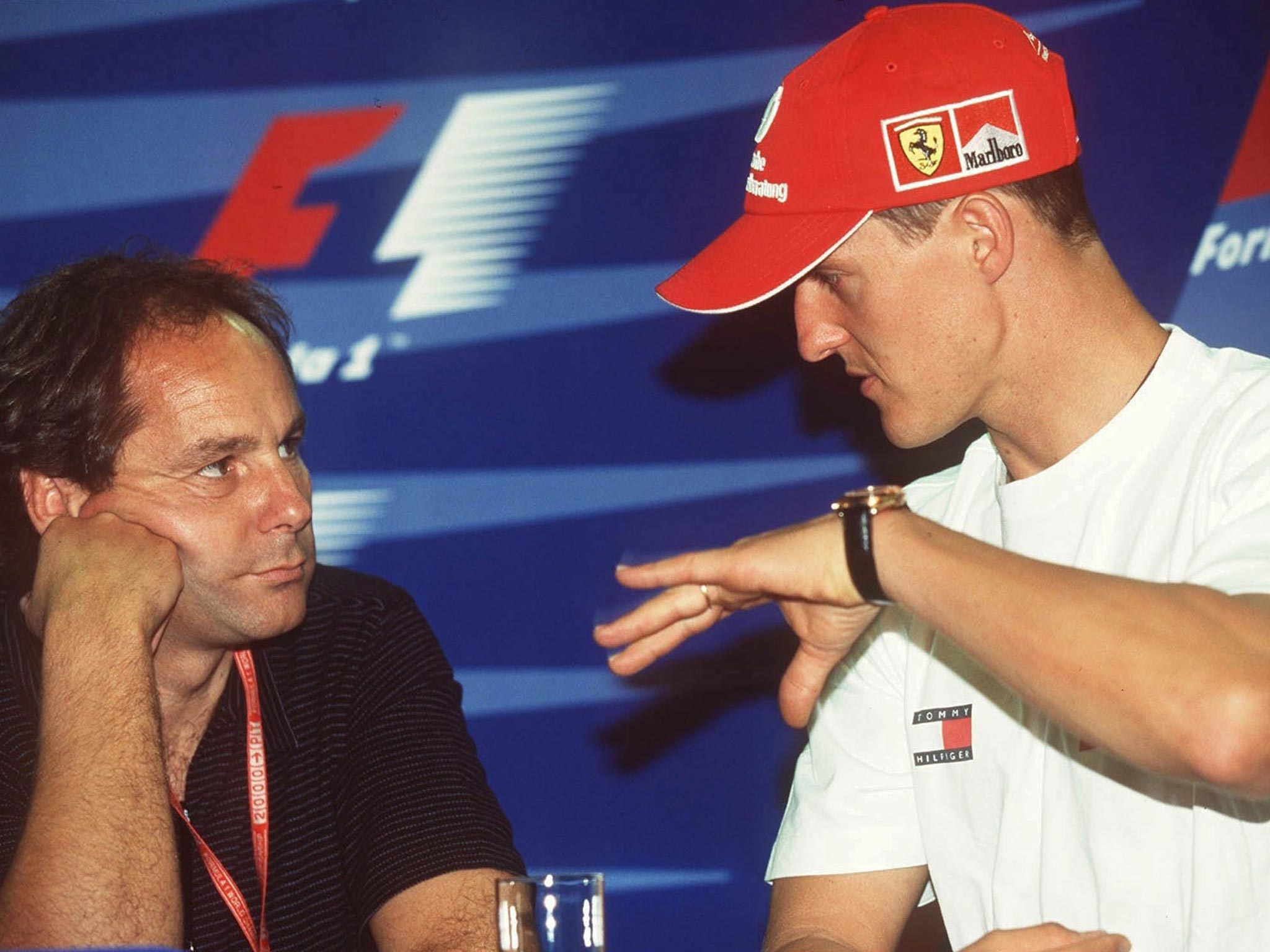 Gerhard Berger and Michael Schumacher in deep conversation during the 2000 Monaco Grand Prix