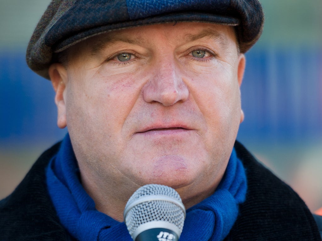 The National Union of Rail, Maritime and Transport Workers (RMT) General Secretary Bob Crow speaks to a gathering outside Kings Cross station in central London on November 18, 2012, the 25th anniversary of the fire that killed 31 people. Union groups held