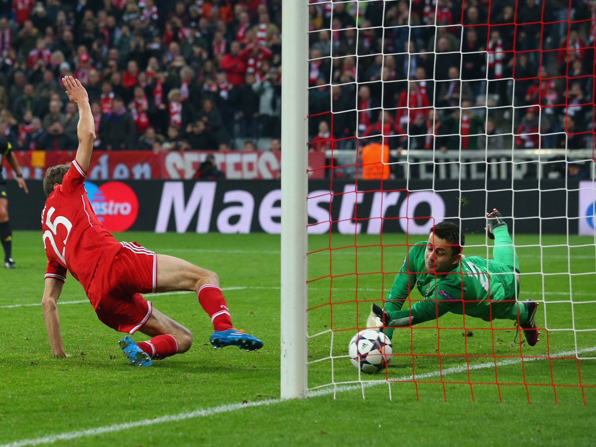 Lukasz Fabianski, keeper of Arsenal saves a penalty by Thomas Mueller