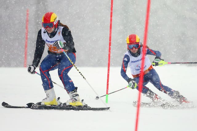Great Britain’s Jade Etherington and guide Caroline Powell on their way to slalom silver
