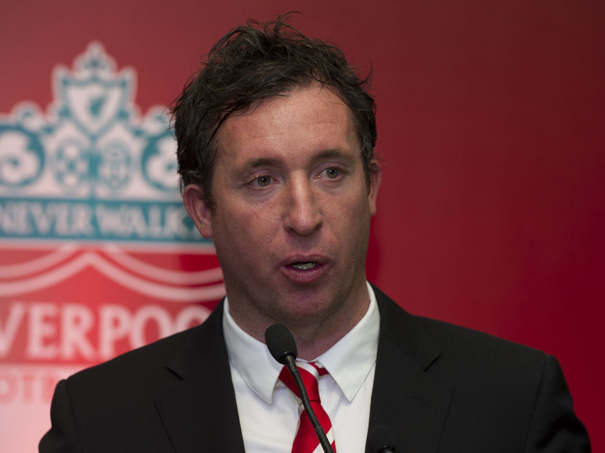 Former Liverpool Football Club and England striker Robbie Fowler speaks to media at an event in New Delhi on January 6, 2014.