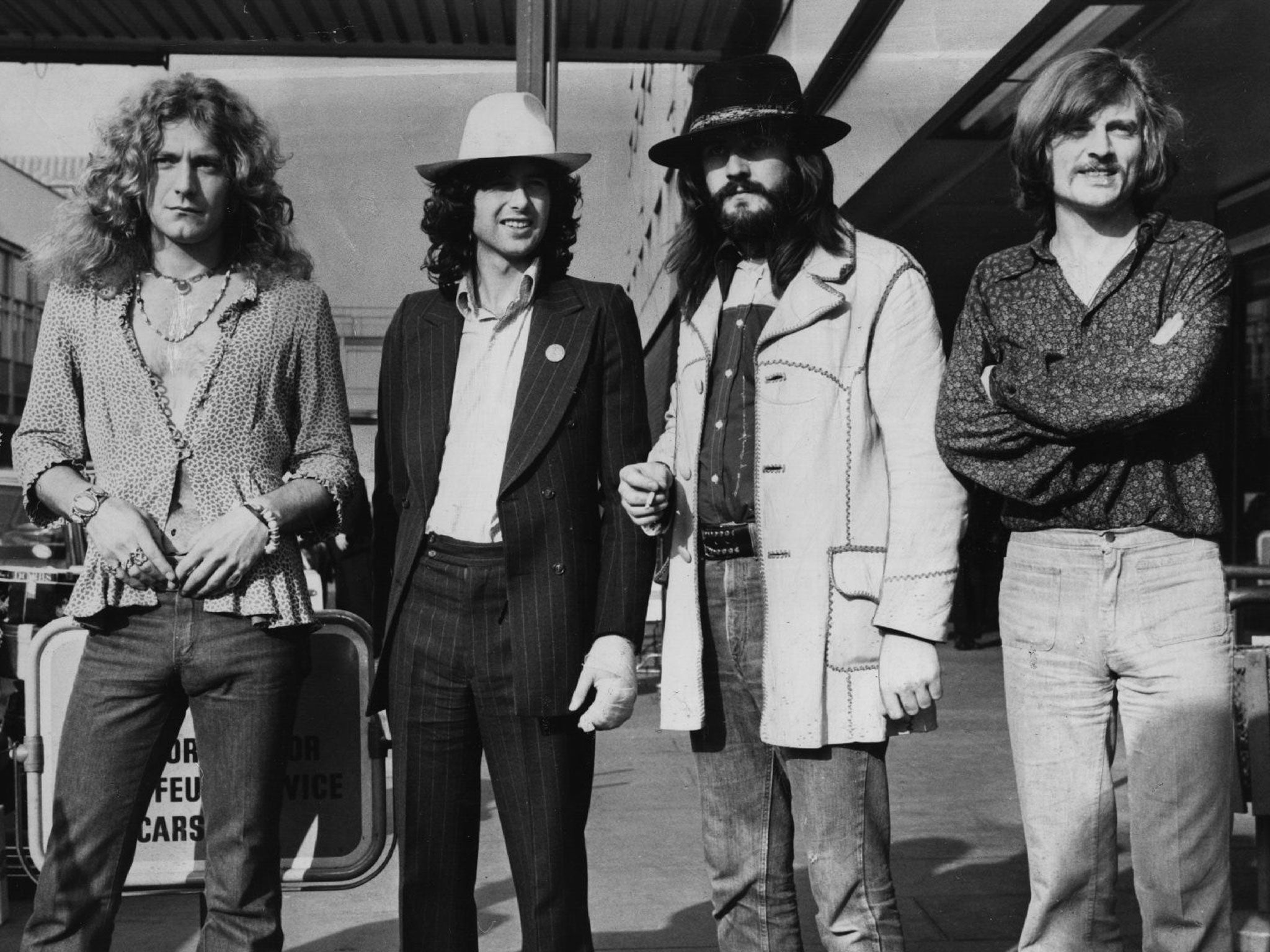 Robert Plant, Jimmy Page, John Bonham, John Paul Jones as Led Zeppelin