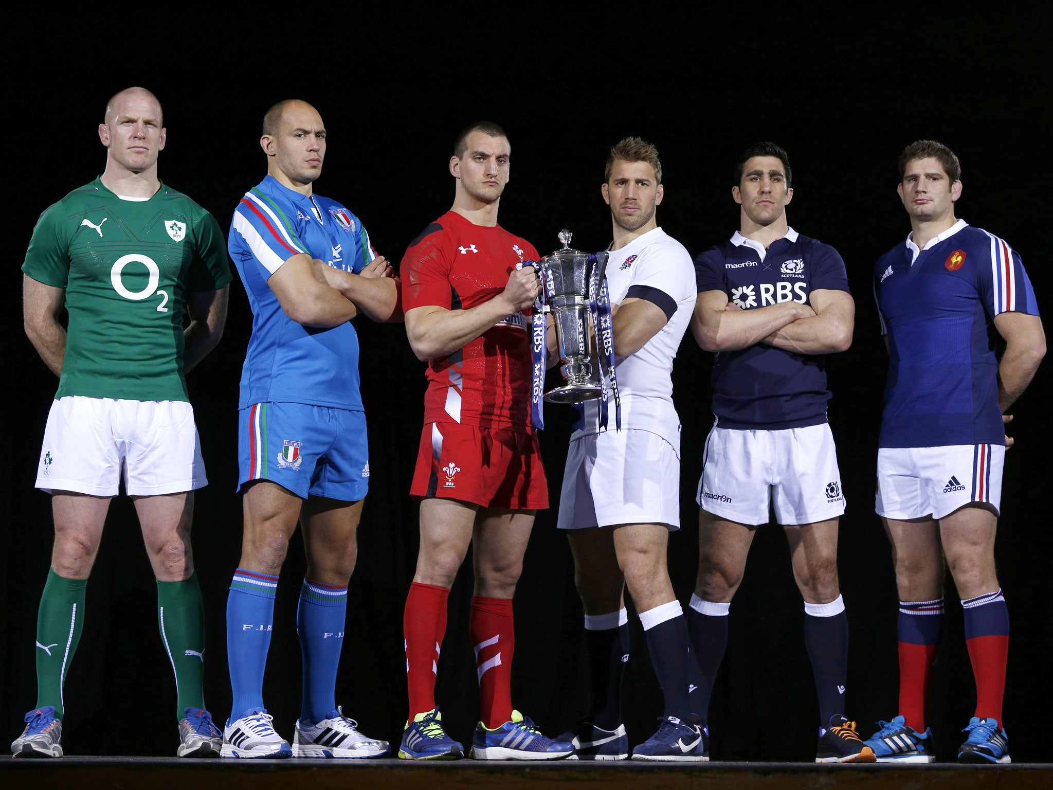 International rugby team captains (L-R) Ireland's Paul O'Connell, Italy's Sergio Parisse, Wales's Sam Warburton, England's Chris Robshaw, Scotland's Kelly Brown, France's Pascal Pape pose with the Six Nations trophy