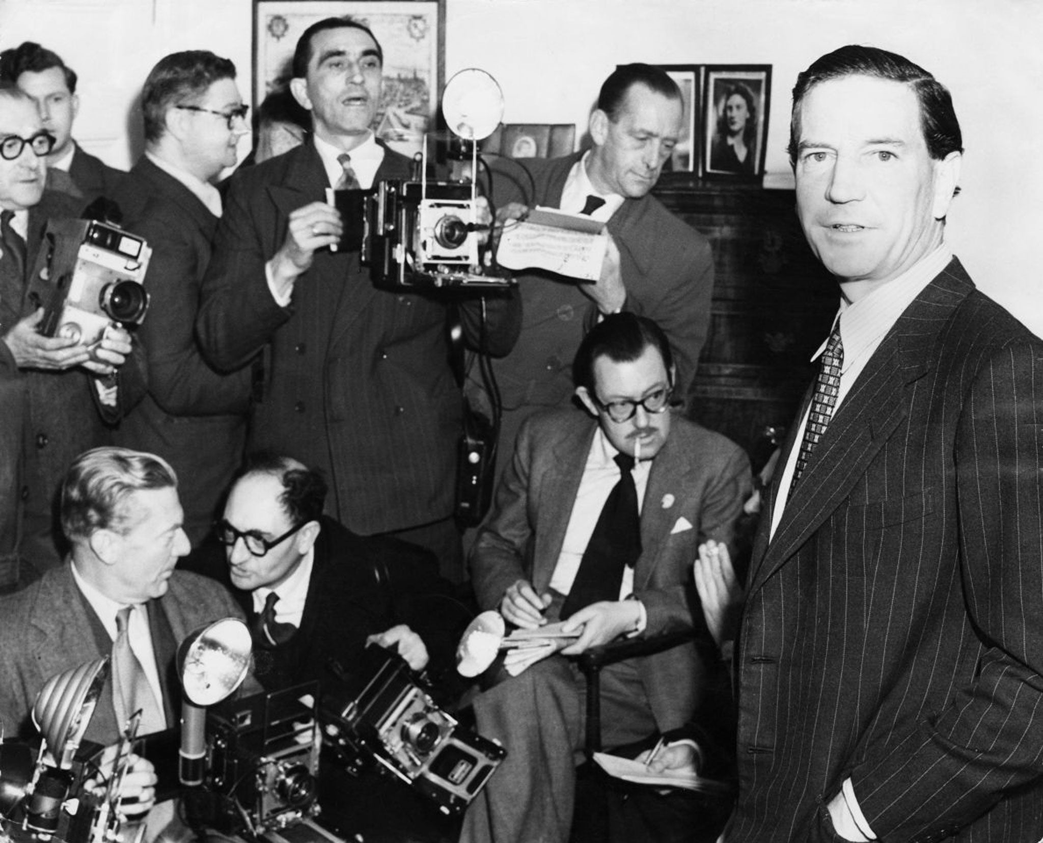 We spy: Kim Philby holds a press conference at his mother's home in London, 1955