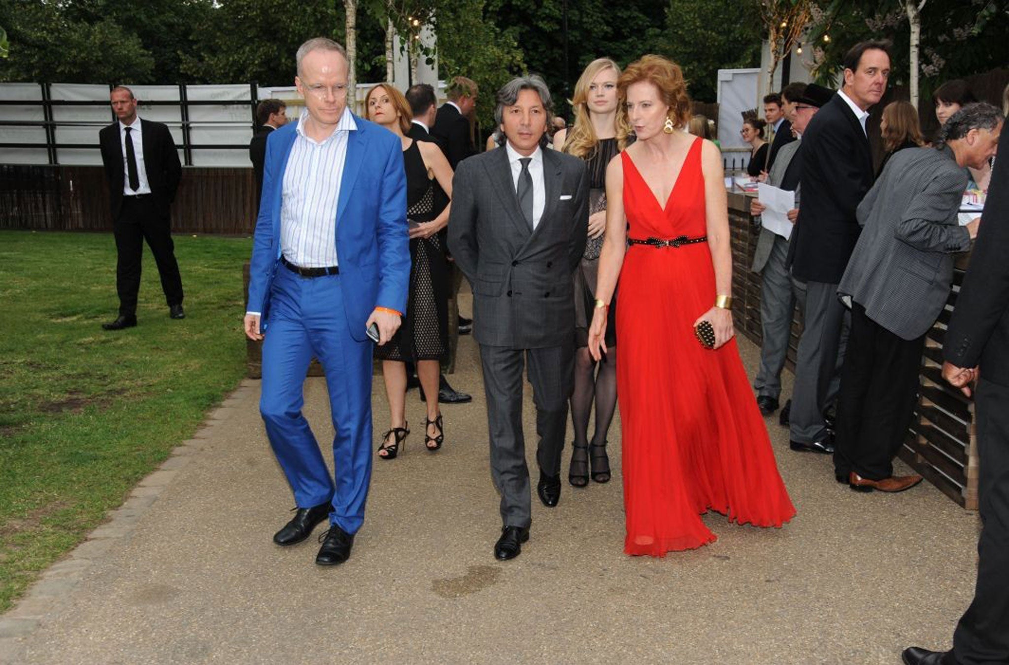 Snake charmer: Hans-Ulrich Obrist, Leon Max and Julia Peyton-Jones, at the Serpentine Summer Party in London's Hyde Park, June 2012