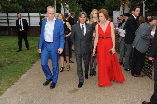 Snake charmer: Hans-Ulrich Obrist, Leon Max and Julia Peyton-Jones, at the Serpentine Summer Party in London's Hyde Park, June 2012