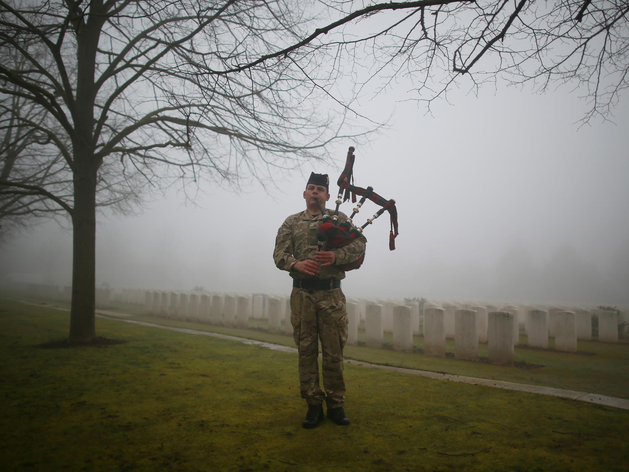 Corporal Stuart Gillies of The 2nd Battalion The Royal Regiment of Scotland practices his bagpipes