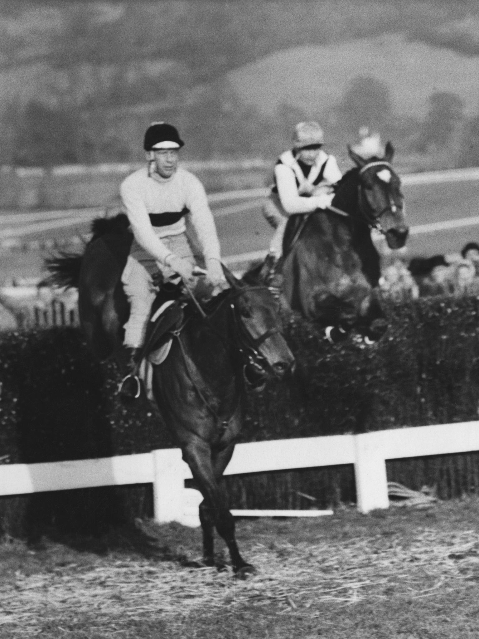The great Arkle with Pat Taaffe on board (left) beats Mill House under Willie Robinson in the 1964 Cheltenham Gold Cup