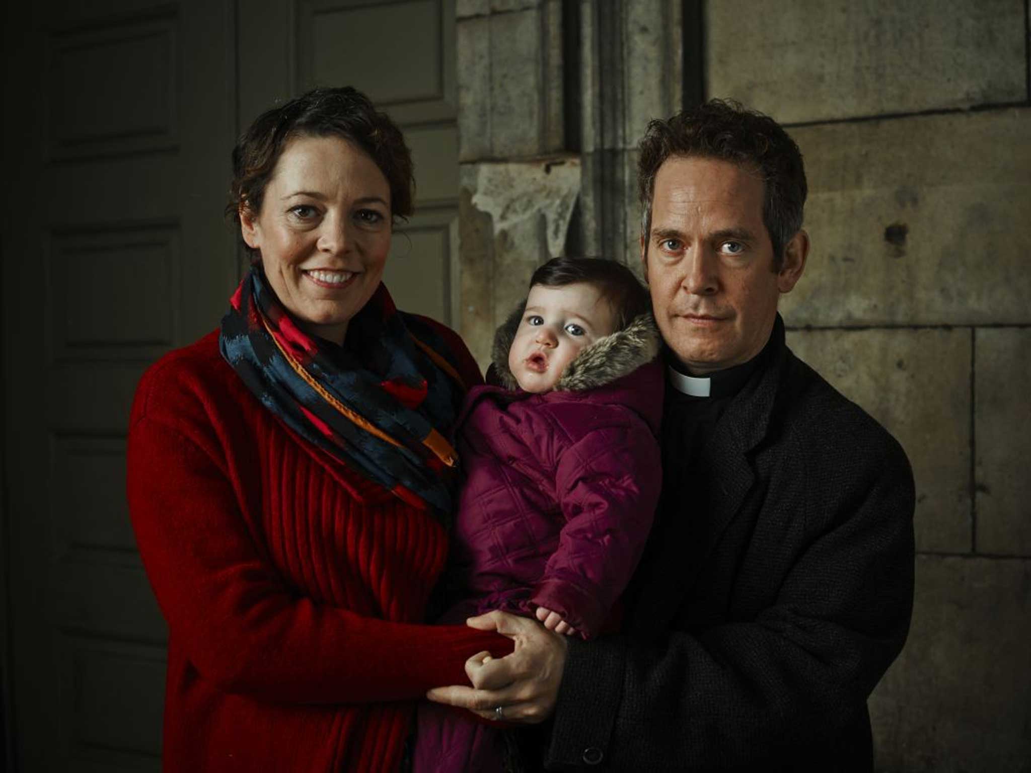 With his screen-wife Alex (Olivia Colman) and one-year-old baby Rich Cain