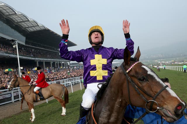 Davy Russell celebrates after riding Lord Windermere to victory in yesterday’s Cheltenham Gold Cup, edging On His Own in a photo finish