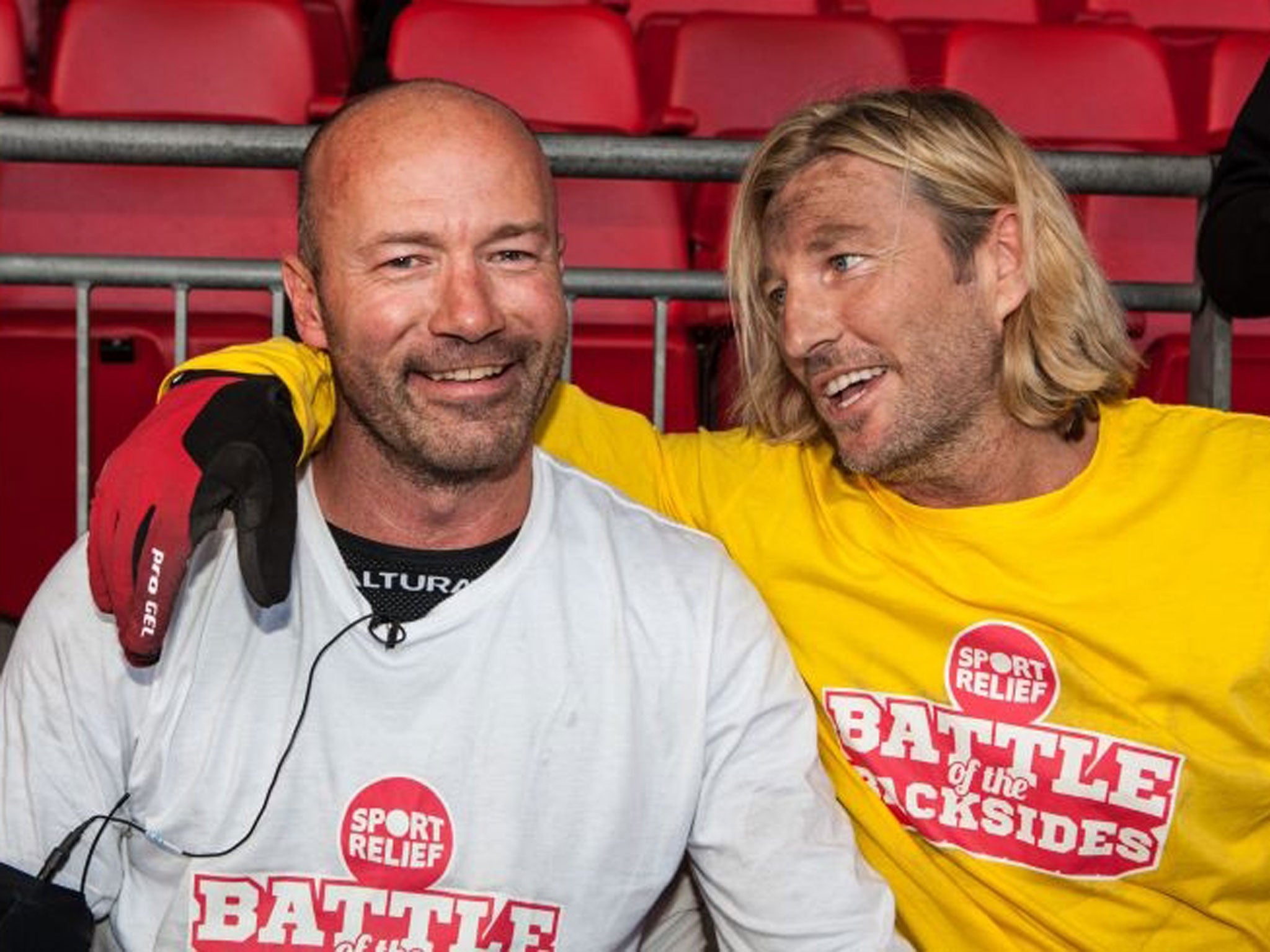 Alan Shearer (left) has been crowned winner of the Battle of the Backsides for Sport Relief, beating fellow competitor Robbie Savage (right) in their race to be the first to sit on half the seats in the iconic Wembley Stadium.