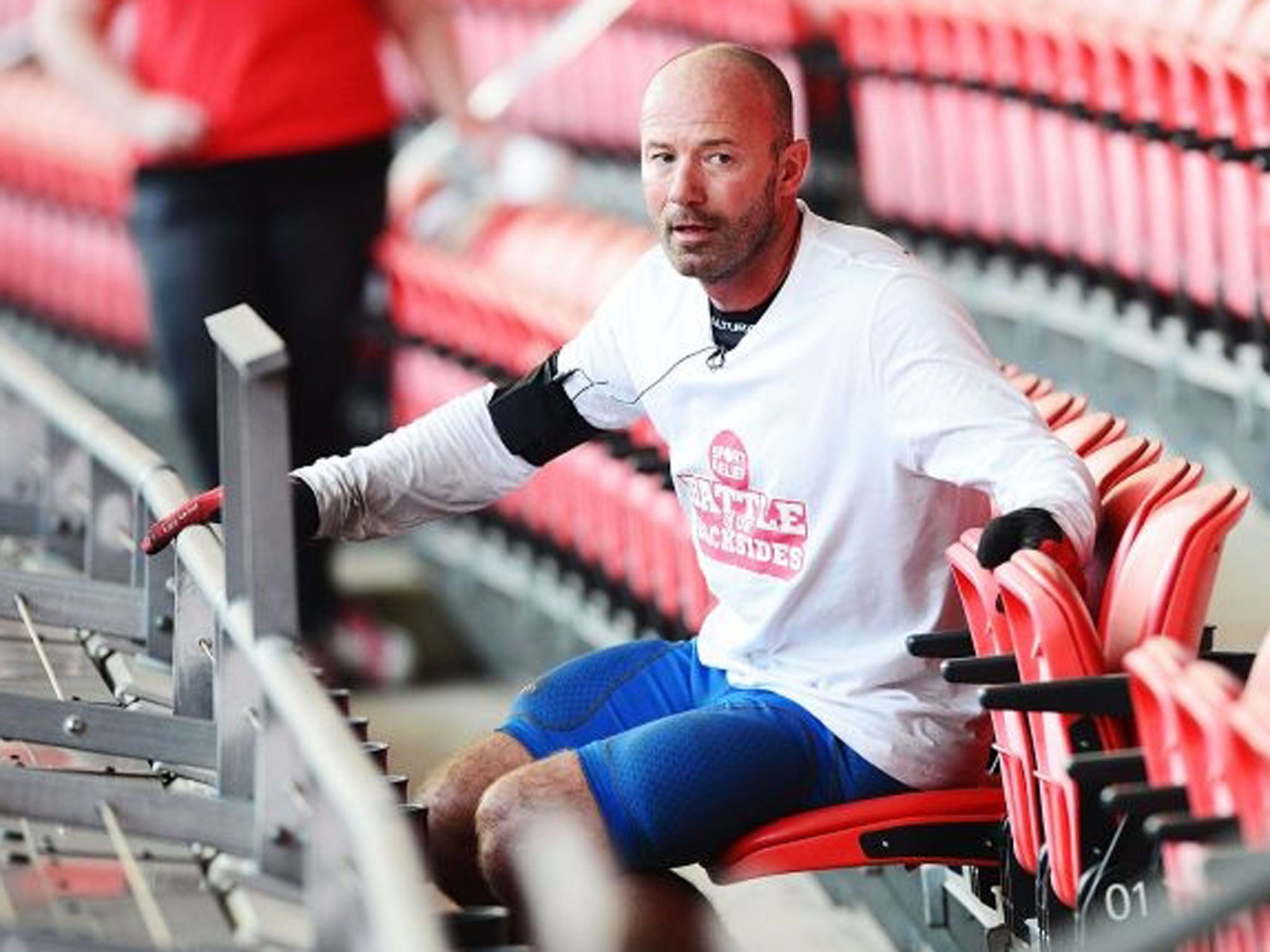 Alan Shearer completes 'The Battle of the Backsides' challenge at Wembley Stadium.