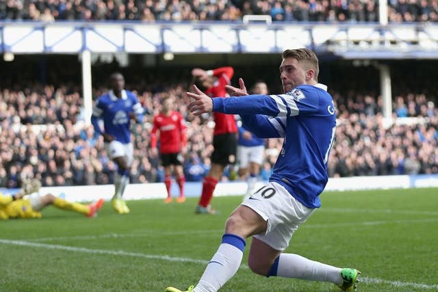 Gerard Deulofeu  of Everton celebrates after scoring the first goal during the Barclays Premier League match between Everton and Cardiff City at Goodison Park