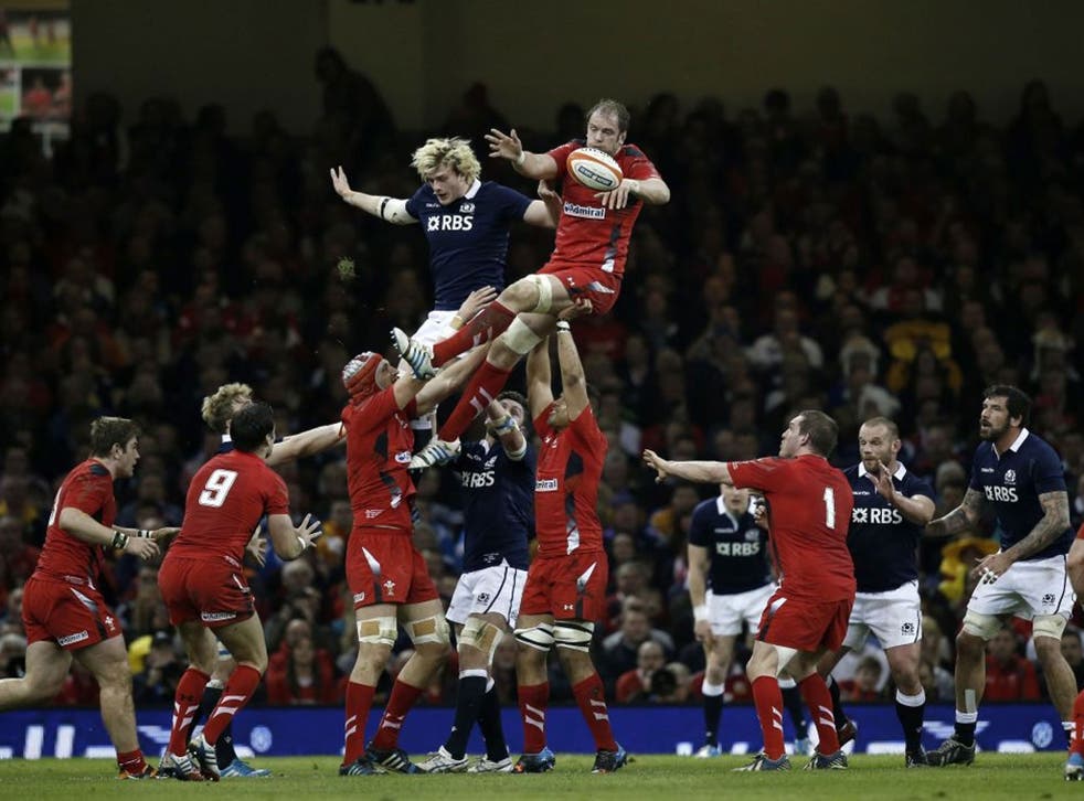 Wales' Lock Alun Wyn Jones (C) wins the ball in a lineout during the Six Nations international rugby union match between Wales and Scotland at the Millennium Stadium in Cardiff (AFP)