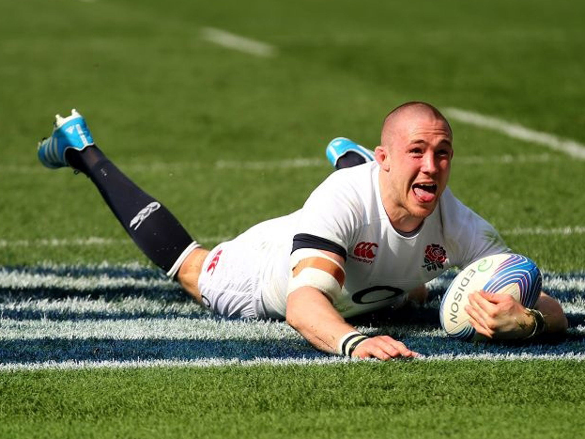 Mike Brown of England celebrates after scoring the first try during the RBS Six Nations match between Italy and England at the Stadio Olimpico (Getty)