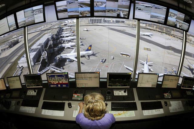 An air traffic controller supervising planes at Frankfurt airport 