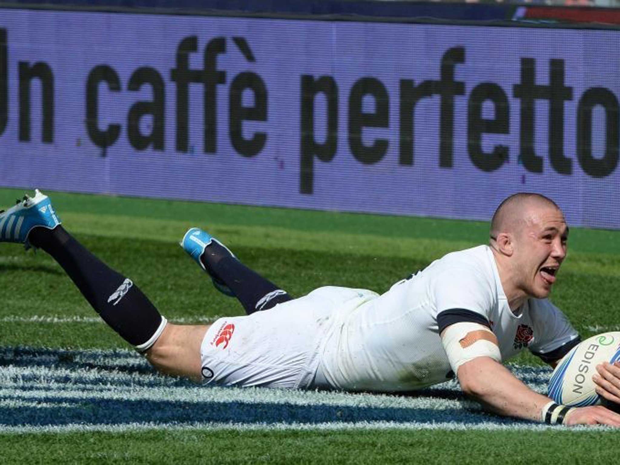Golden Brown: The England full-back goes over for the second of his two tries against Italy in Rome yesterday