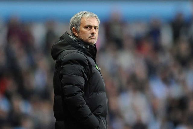 Chelsea manager Jose Mourinho looks on from the touchline 