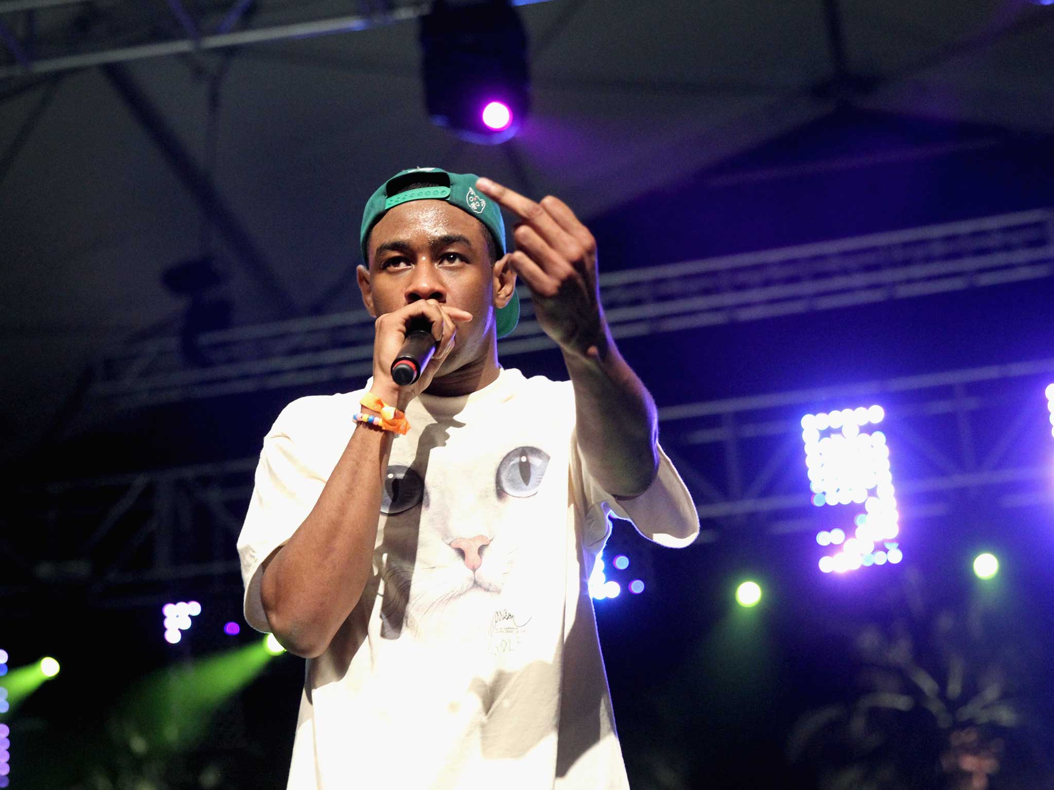 Rapper Tyler The Creator performs with Earl Sweatshirt onstage during day 1 of the 2013 Coachella festival