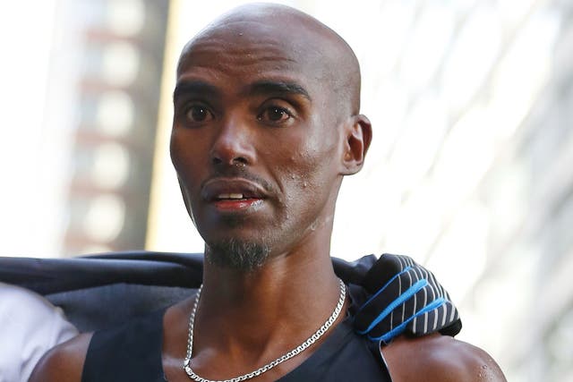 Mo Farah pictured shortly before collapsing at the finish line in New York on Sunday. He recovered to attend the press conference afterwards