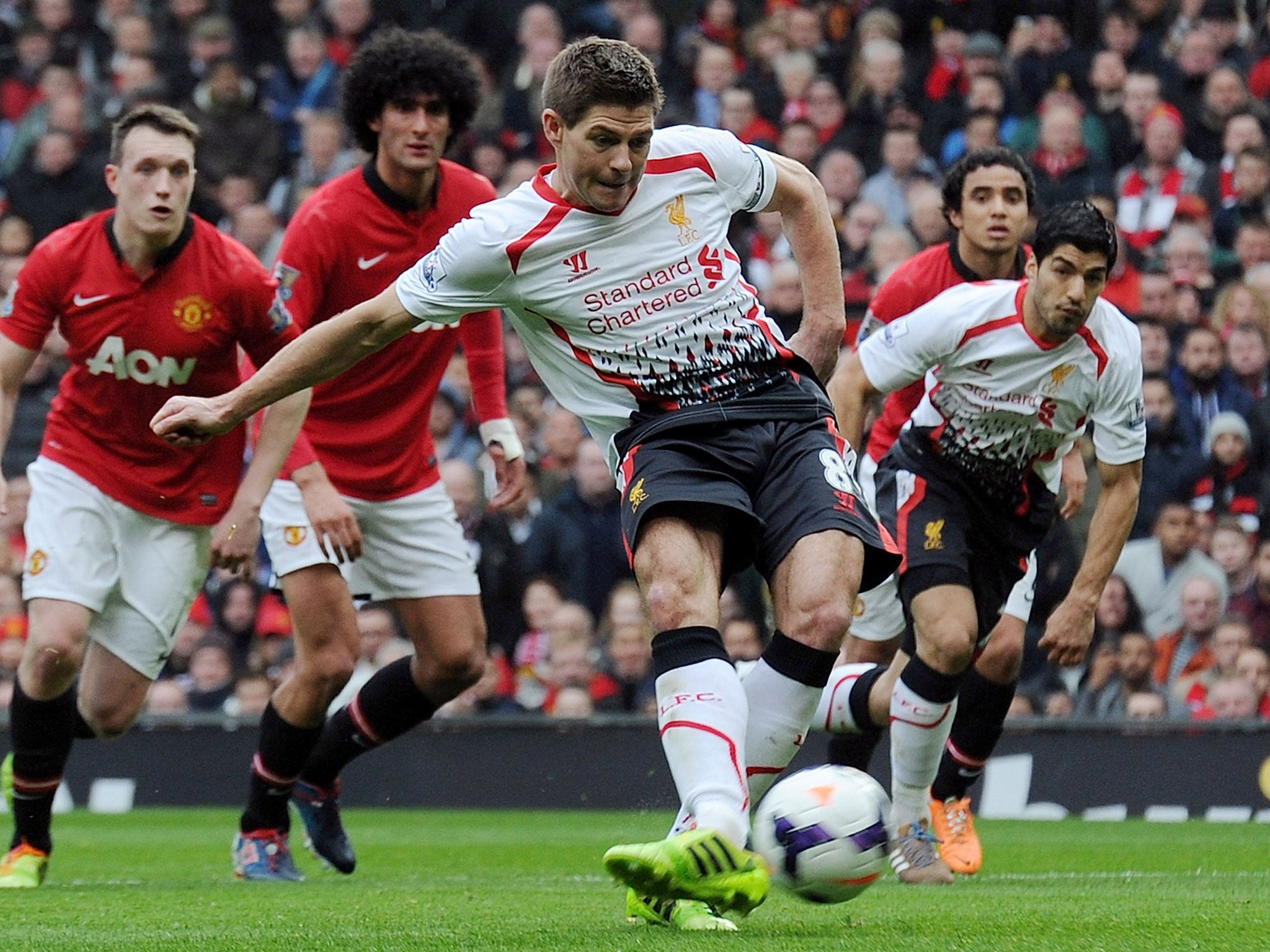 Steven Gerrard scores his first penalty of the game