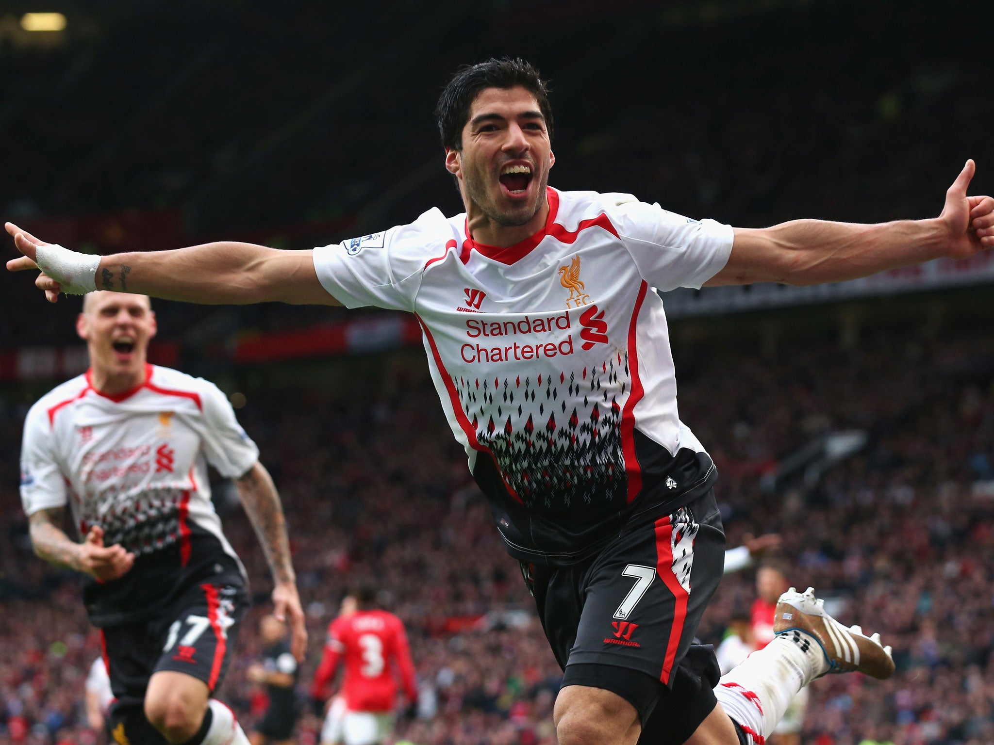 Luis Suarez celebrates Liverpool's third (GETTY)