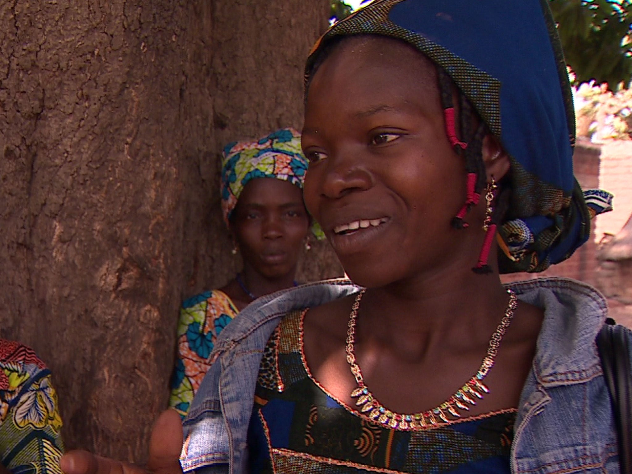 Bebe, 24, one of nearly 30 Moussodougou villagers who head by packed bus to the Pleasure Hospital in Bobo for clitoris reconstruction