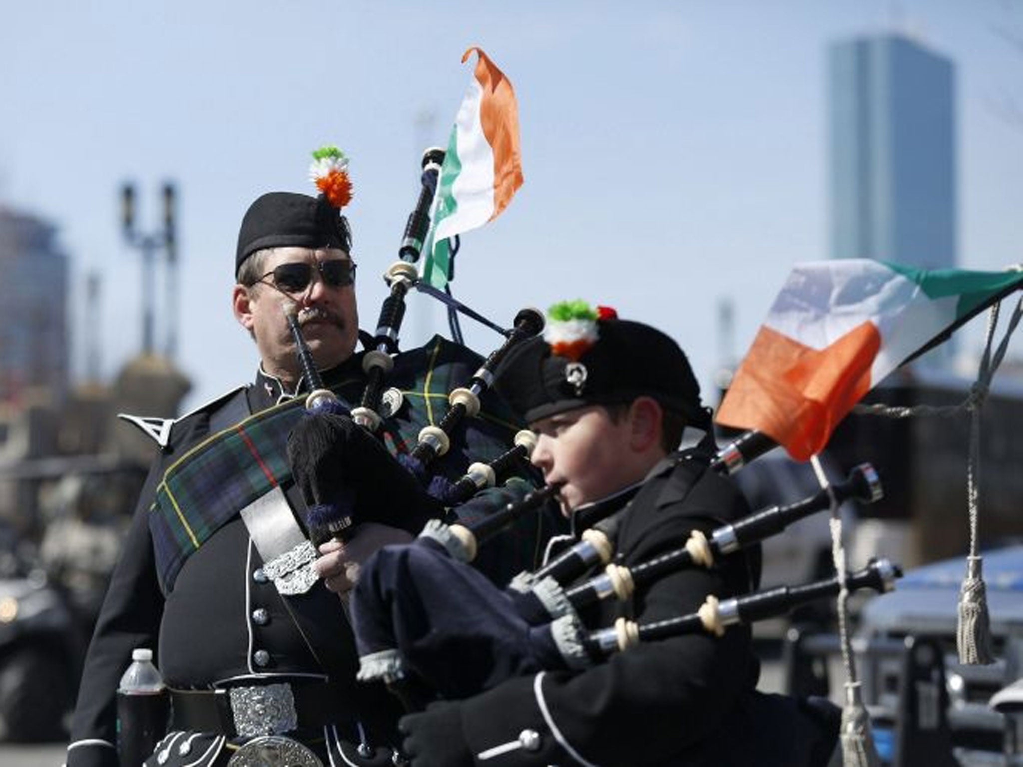 Members of the Quaboag Highlanders Pipes and Drums prepare to march down Broadway during the annual South Boston St. Patrick's Day parade in Boston, Massachusetts March 16, 2014. Boston's Irish-American mayor skipped the parade on Sunday after failing to