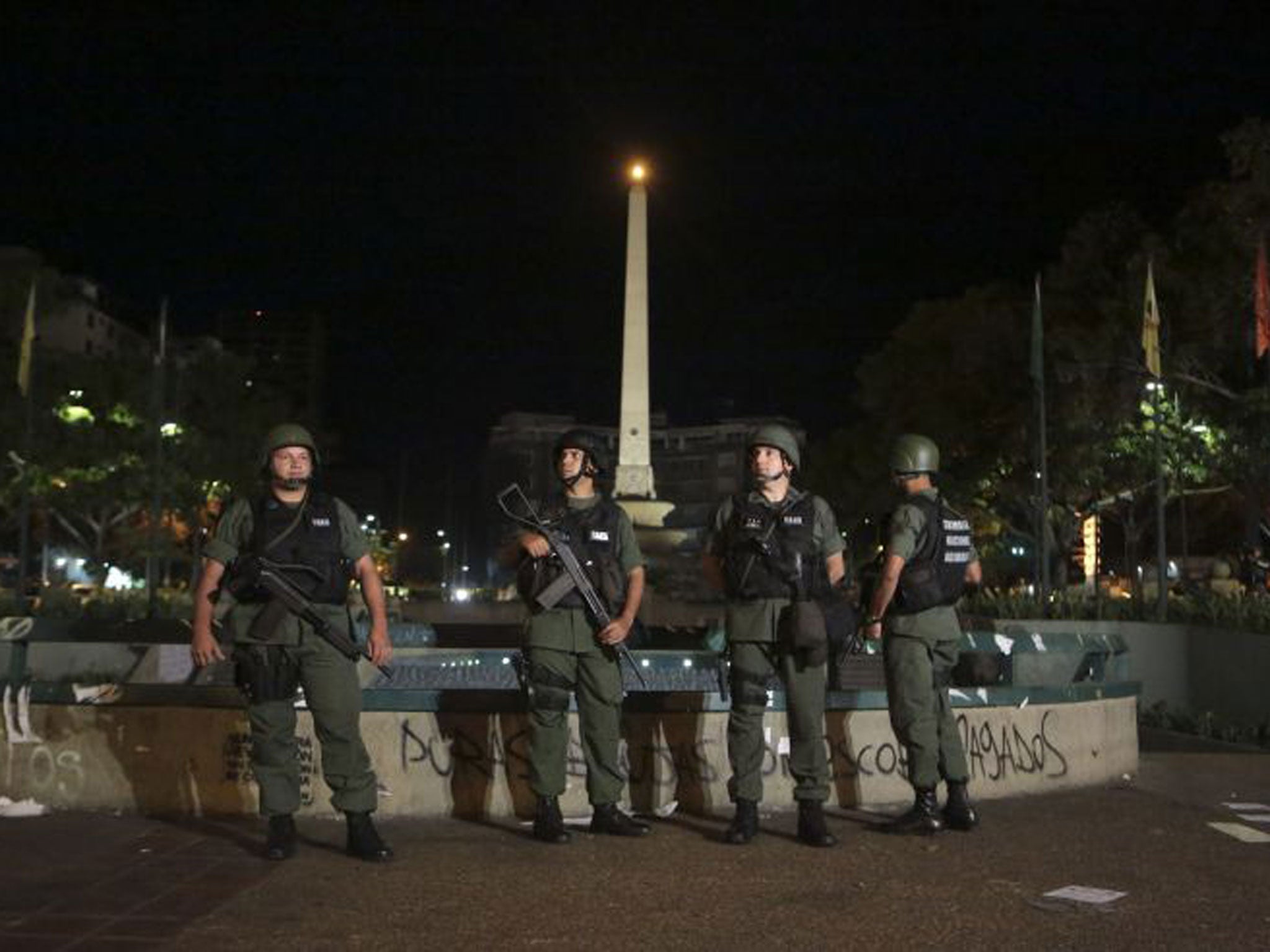National Guardsmen stand guard at Plaza Altamira in Caracas