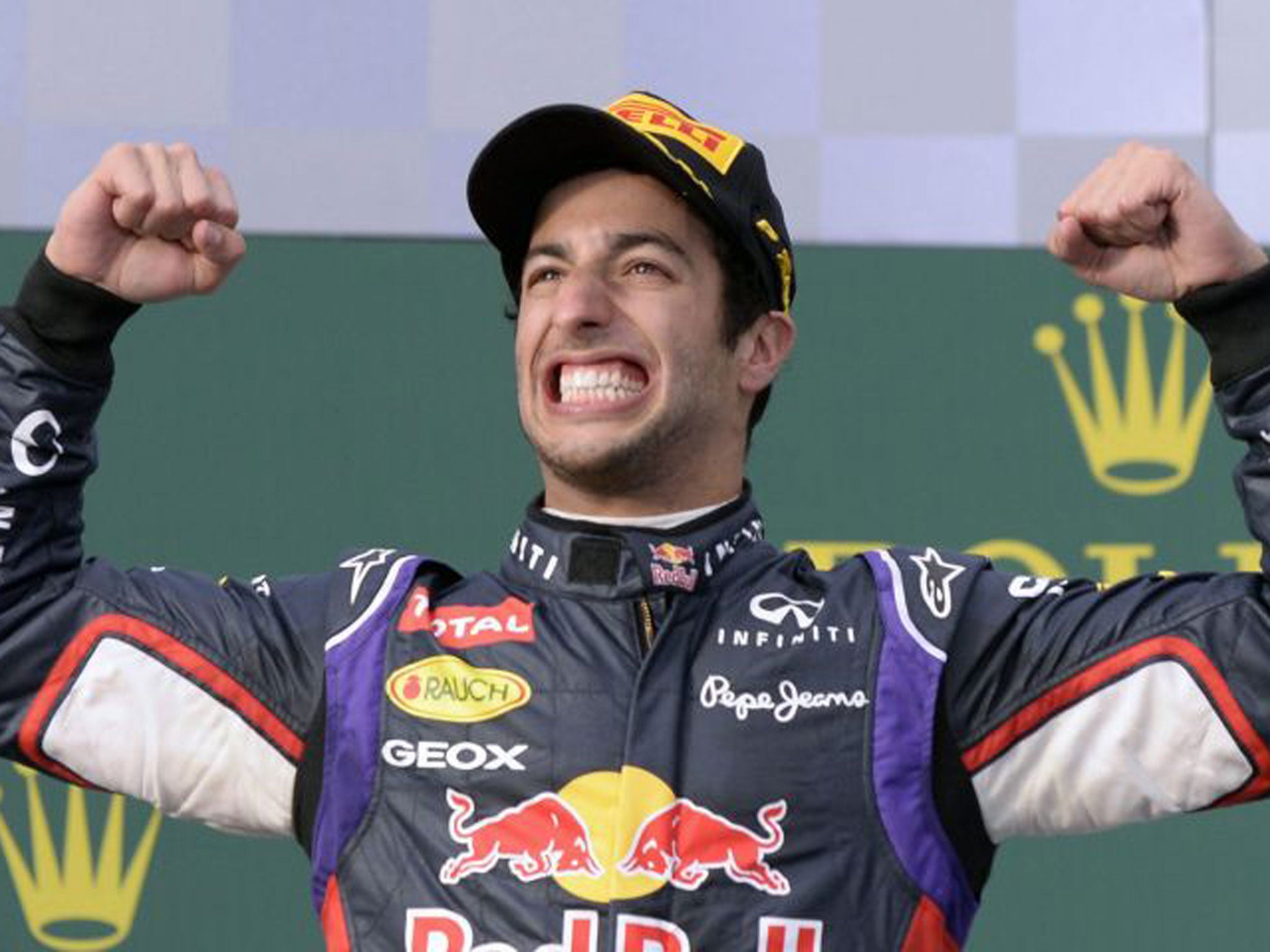Daniel Ricciardo celebrates on the podium before his disqualification in Melbourne on Sunday