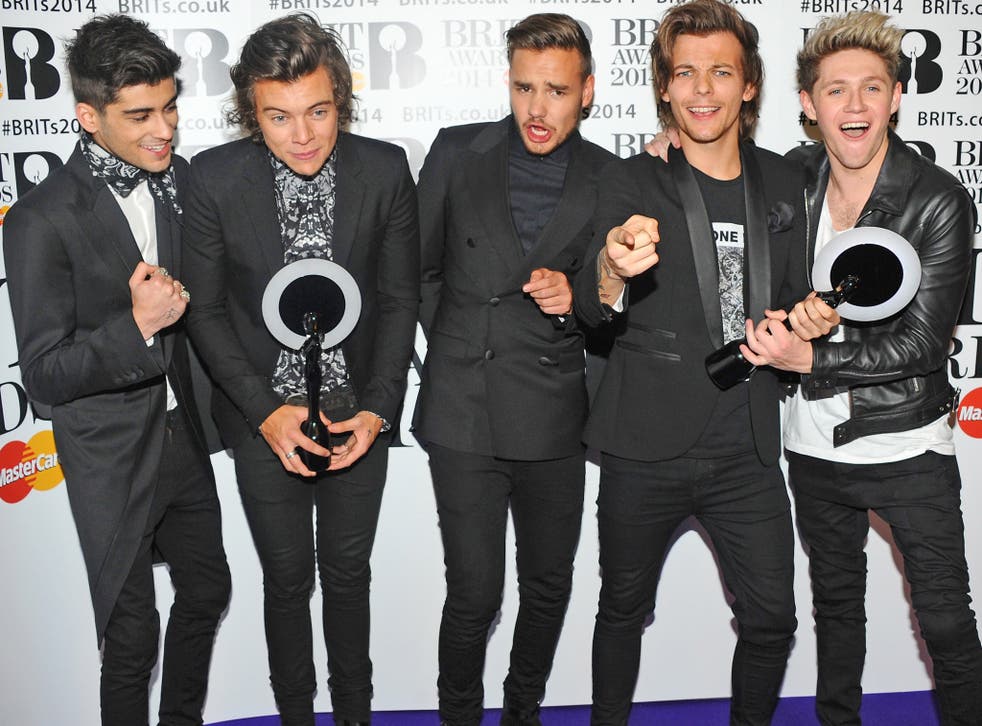 One Direction with the two Brit Awards they won earlier this year