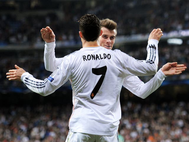 Cristiano Ronaldo and Gareth Bale celebrate during Real Madrid's Champions League win over Schalke