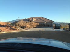 Utah house almost entirely obscured by tumbleweeds following windstorm