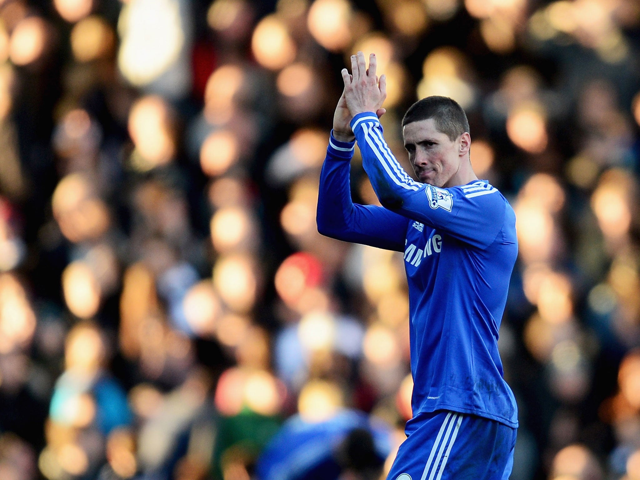 Fernando Torres of Chelsea applauds the crowd