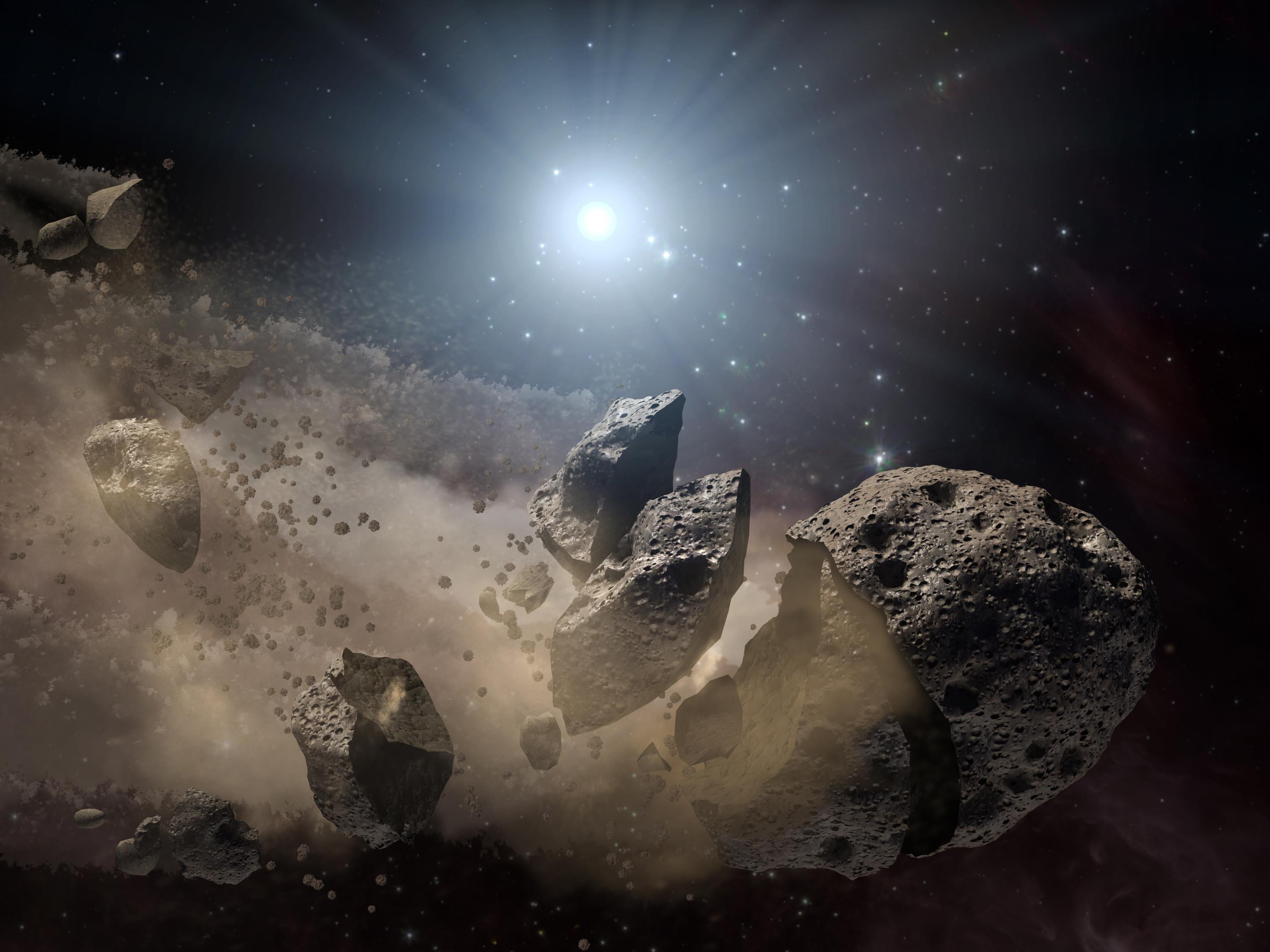 An artist's conception of a broken up asteroid. When debris is flung off an asteroid it can stay orbiting the object as a tiny moon.