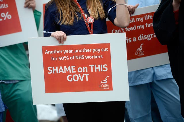 Protests against NHS cuts ahead of the Budget on March 19, 2014 in London, England