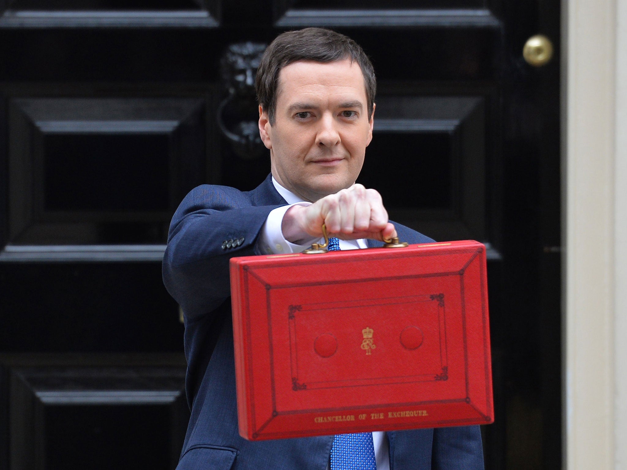 British Chancellor of the Exchequer George Osborne holds the budget box outside 11 Downing Street in London