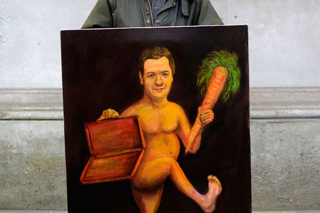Kaya Mar holds a painting of George Osborne outside downing street ahead of the Budget in London 