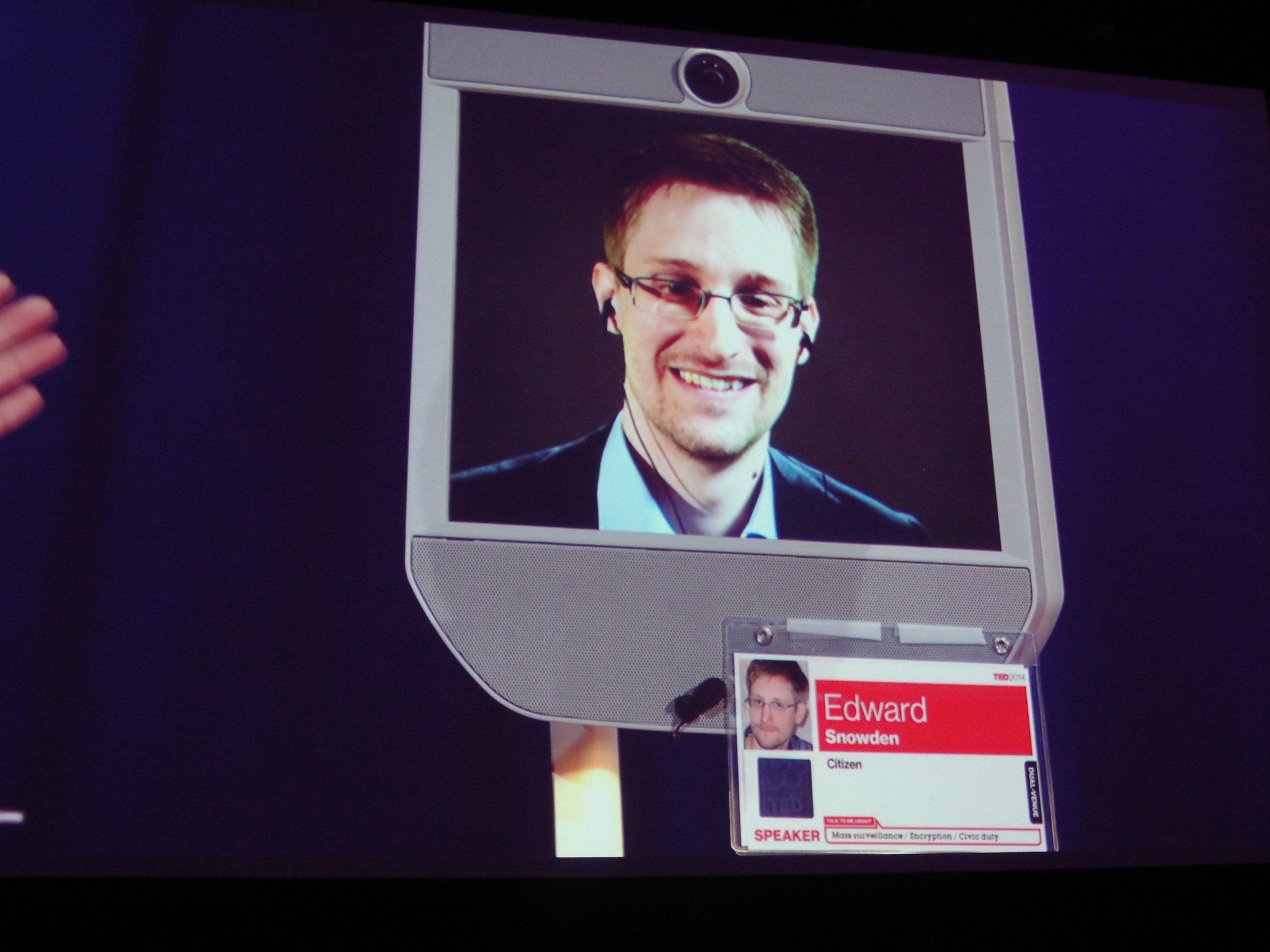 Snowden appears in a telepresence machine, but is given his own badge for attending TED.