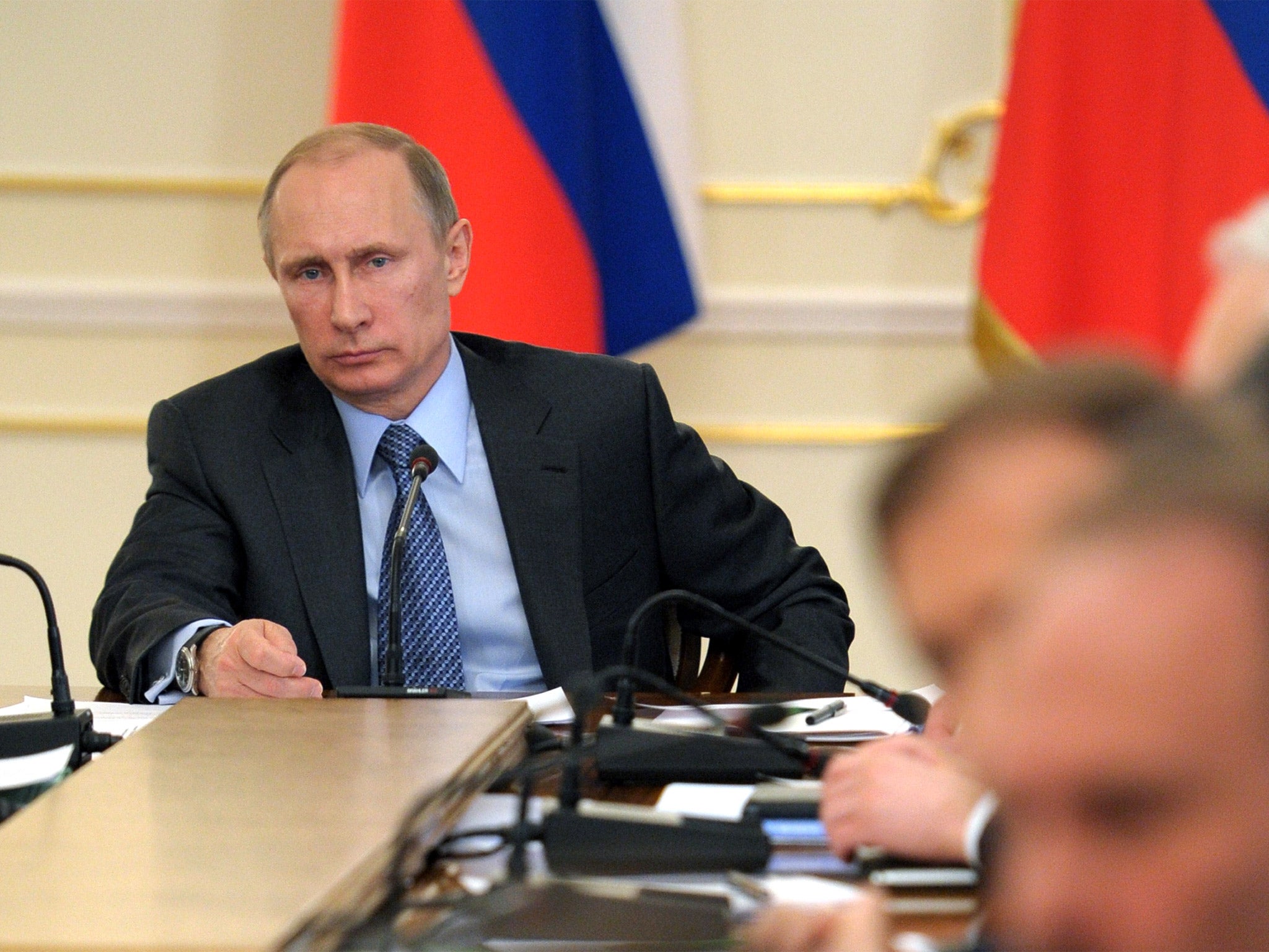 President Vladimir Putin chairs a government meeting in the Novo-Ogaryovo residence outside Moscow