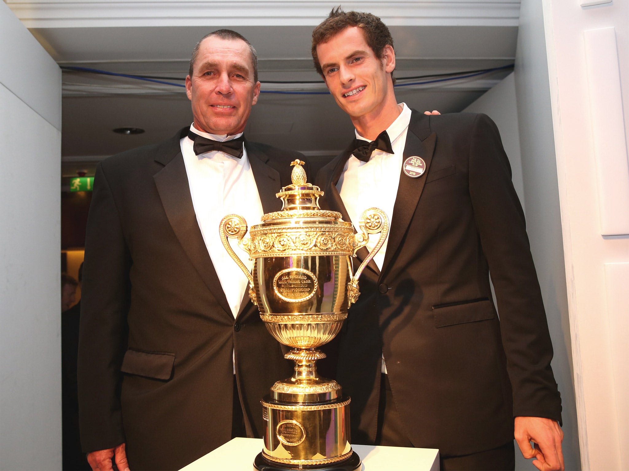 Lendl and Murray pose with the Wimbledon trophy last summer