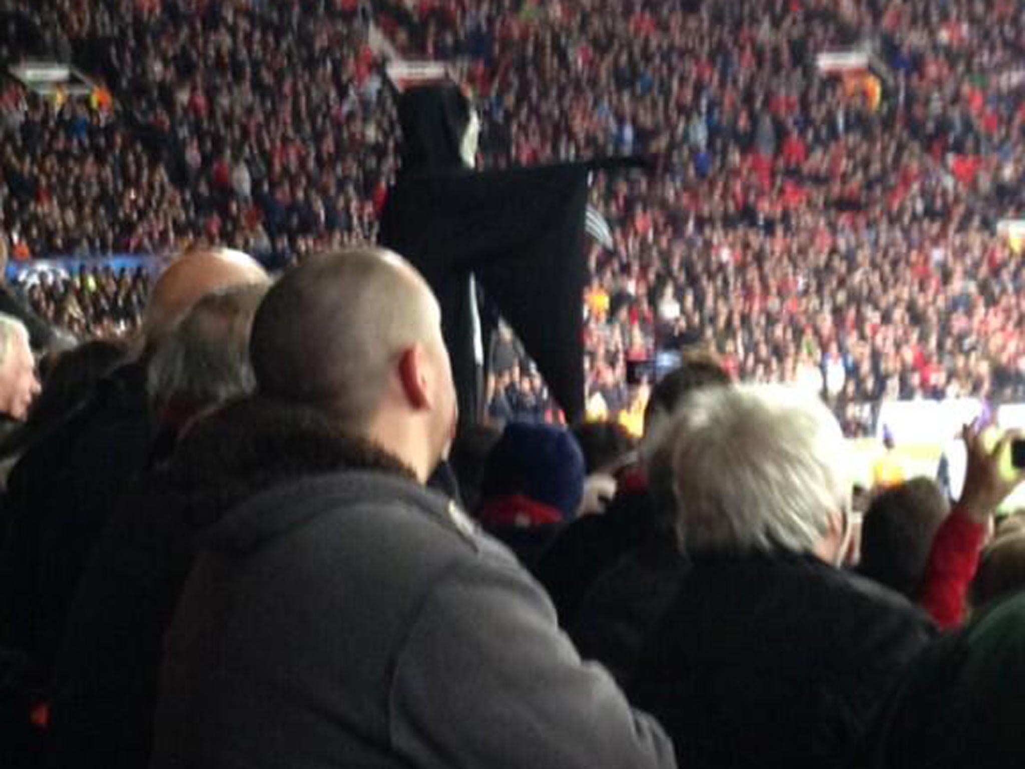 A fan dressed up as the Grim Reaper during Manchester United's win over Olympiakos, shouting at David Moyes "Moyes, I'm coming to get you!"