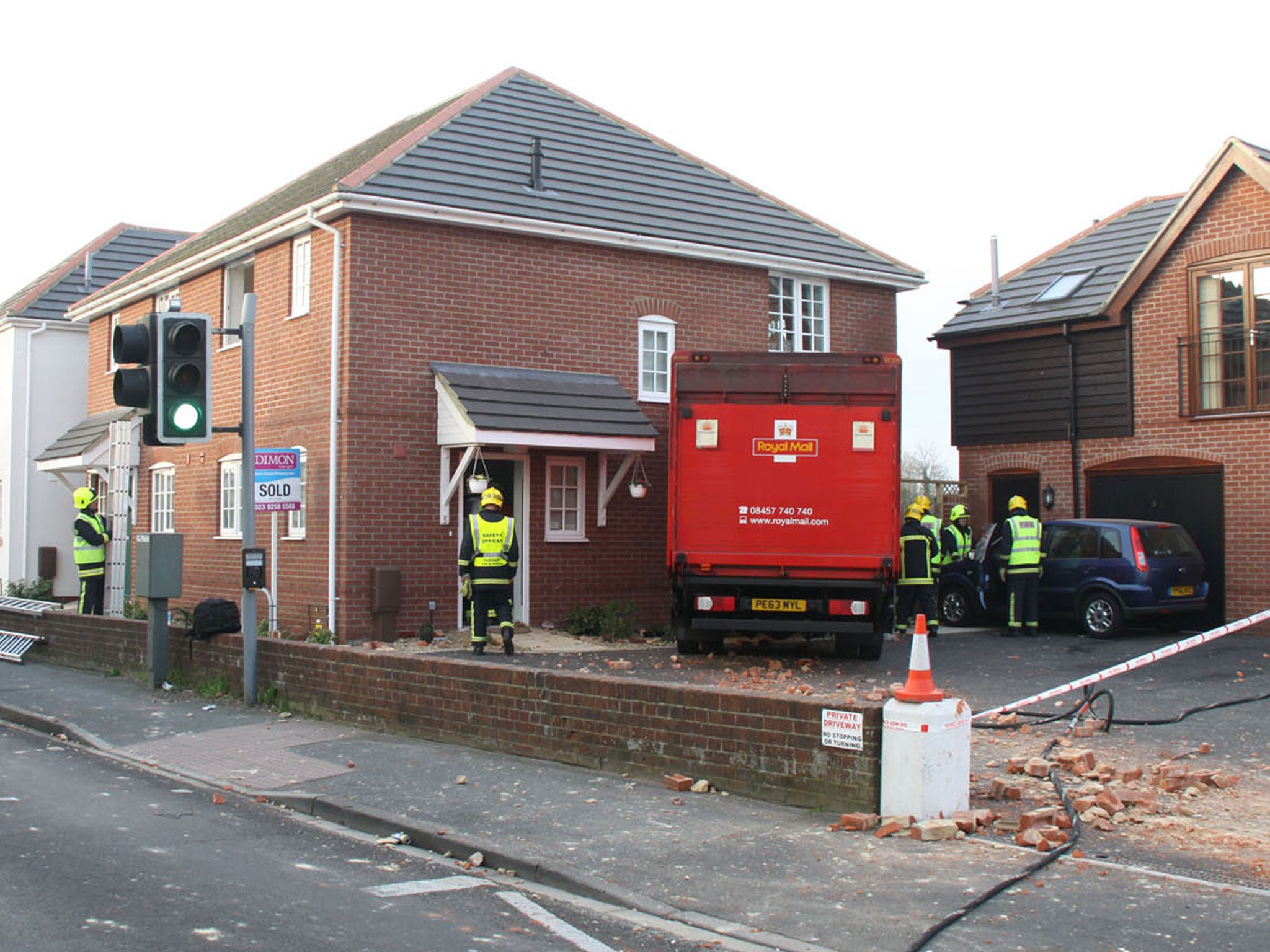 The elderly couple had to be rescued by firefighters after they became trapped in the upstairs of the house (PA)