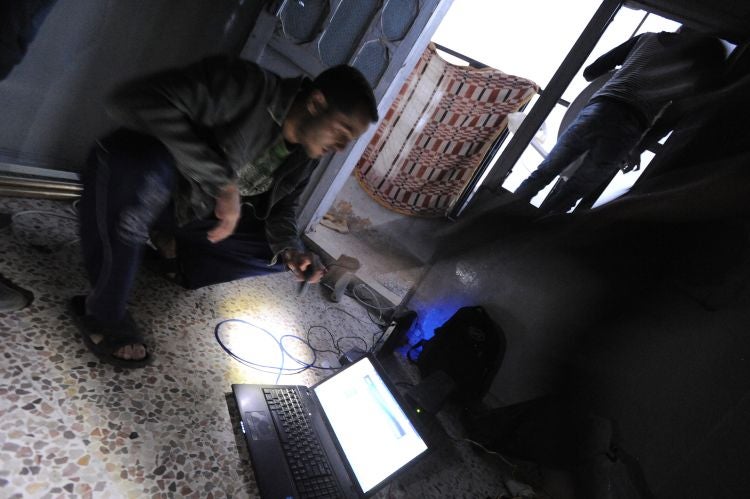 Anti-government Syrian media activists set up an illegal internet satellite