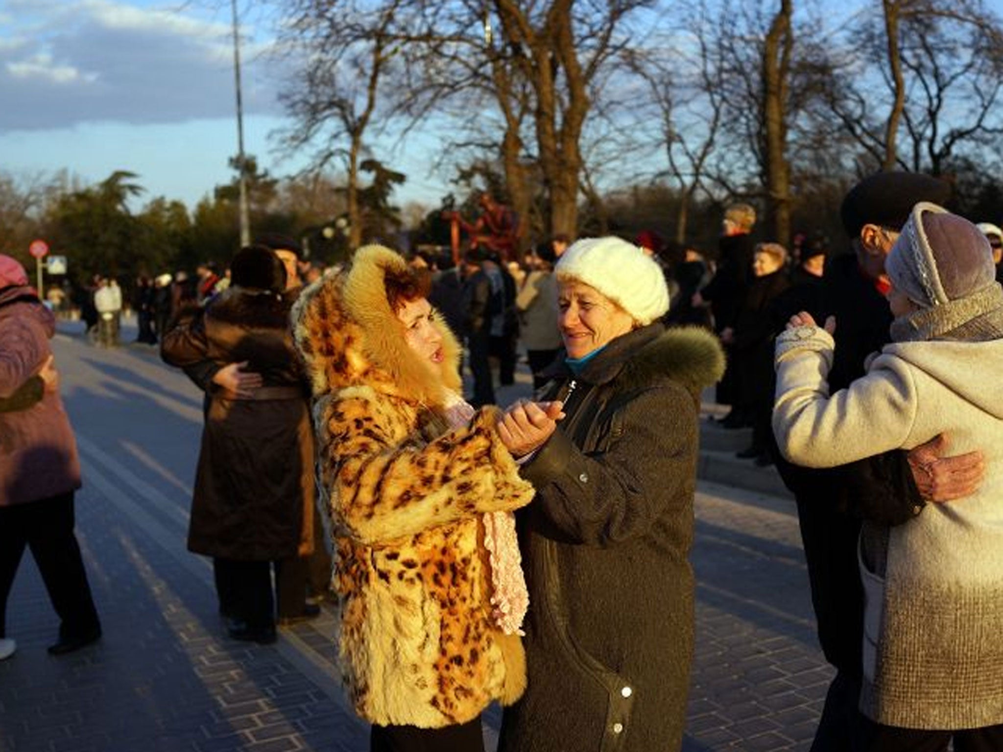 YEVPATORIA, UKRAINE - MARCH 12: Older couples dance at a rally in support of the upcoming referendum on March