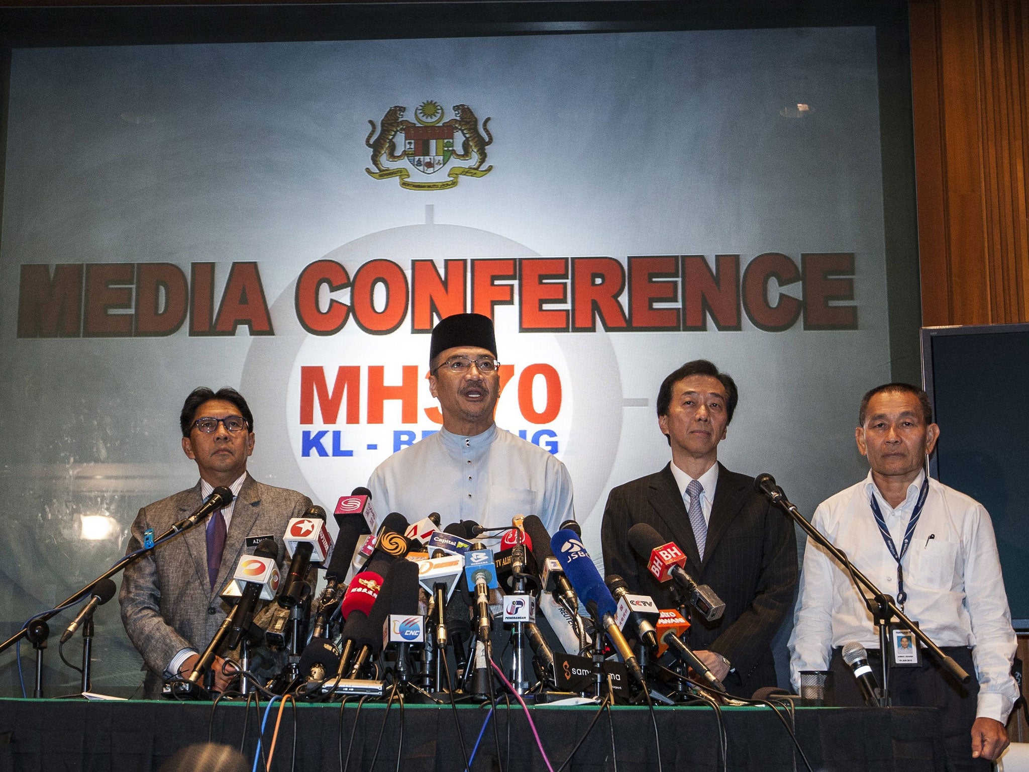 Malaysian Defence Minister and acting Transport Minister Hishamuddin Hussin speaking at a press conference.