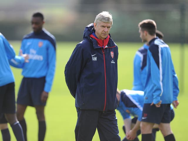 Arsene Wenger takes charge of Arsenal training on the eve of his 1,000th match in charge of the Gunners